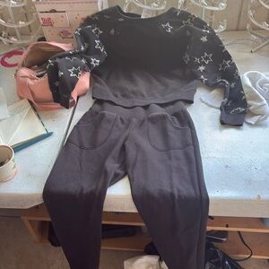 Sweat pants and stare sweater